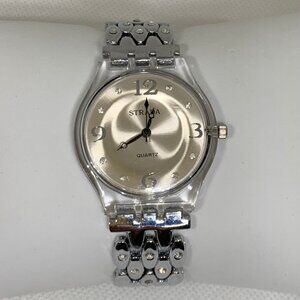 Strada women watch silver tone clear plastic case 34mm  beige dial running